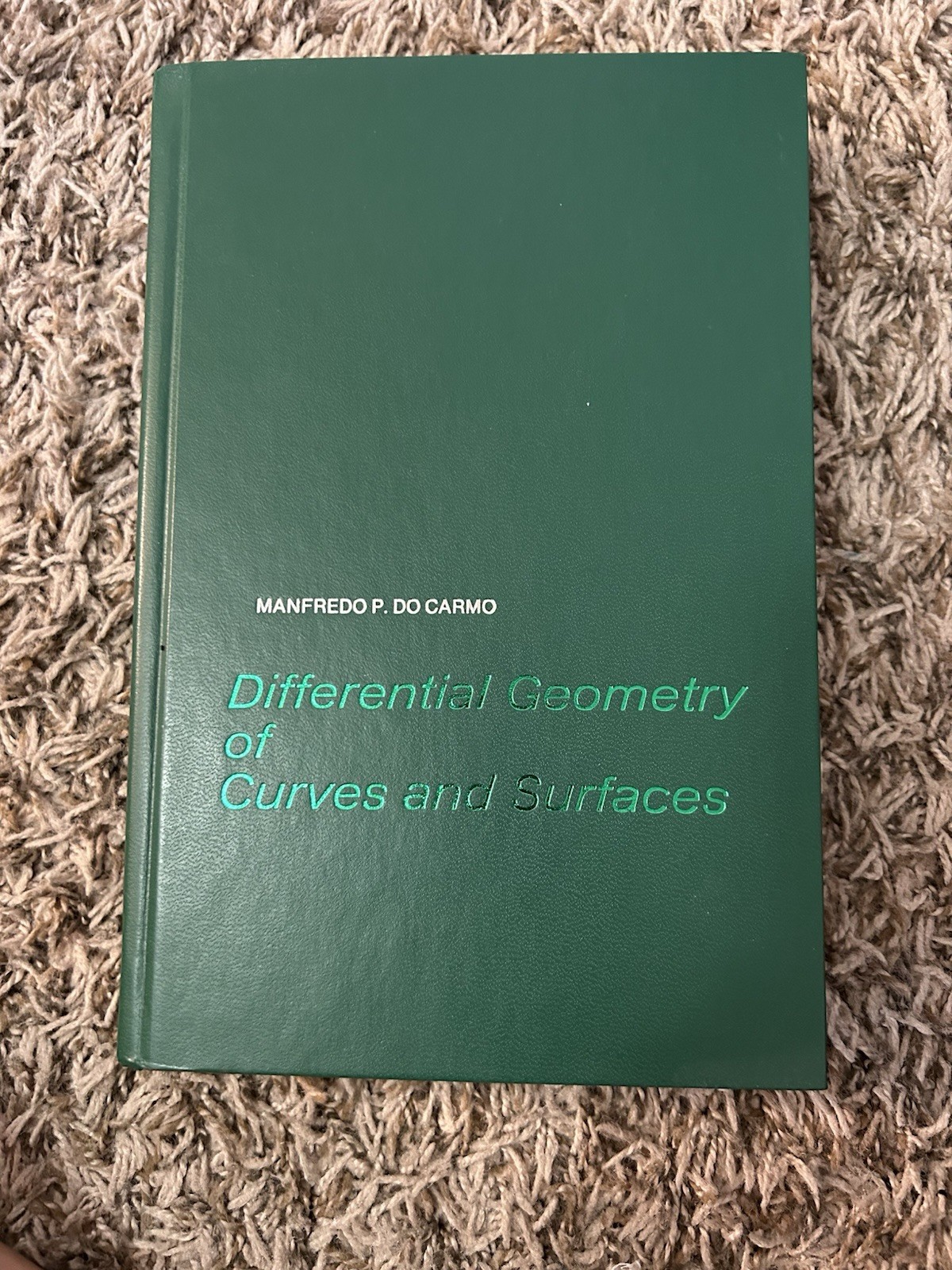 Differential Geometry of Curves and Surfaces by Manfredo P. DoCarmo (Hard cover)